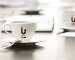 Рекламная группа «TDI Group» разработала логотип и фирменный стиль для сети кофеен «Union Coffee»